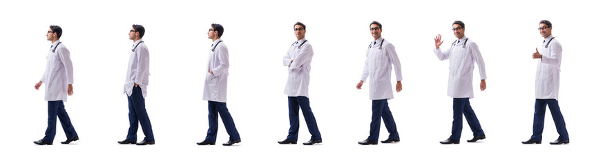 Young doctor physician standing walking isolated on white backgr