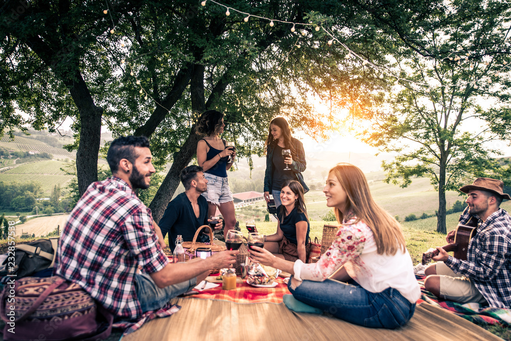 Wall mural group of friends eating in the nature