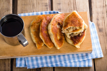 Homemade fried mushroom patties, rustic style, vintage, wooden background