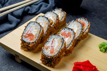 Hot roll with salmon and crab