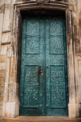 Fototapeta na wymiar doors in the wall of the old city
