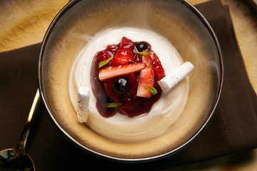 Cook chef making fruit ice cream added liquid nitrogen