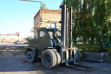 Old car loader. Back view.
