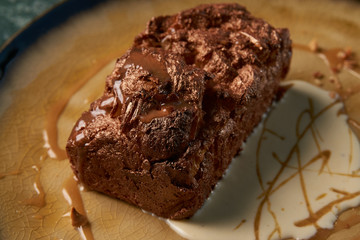 Plate with dessert , chocolate fondant lava cake with custard