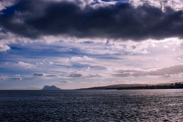 Gibraltar. View of Gibraltar, the Mediterranean Sea and the cloudy sky. Costa del Sol, Andalusia, Spain.