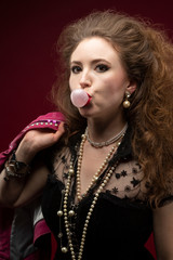 Girl 1980's style with bubble gum
