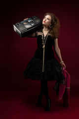 Girl 1980's style, with boom box
