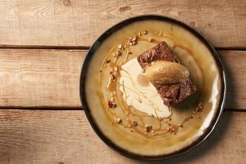 Delicious chocolate fondant lava cake with custard and pistachio