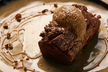 Delicious chocolate fondant lava cake with custard and pistachio