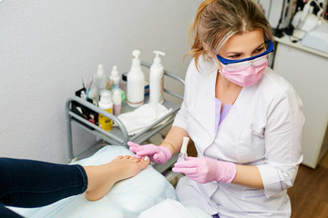 Pedicure in the beauty salon.