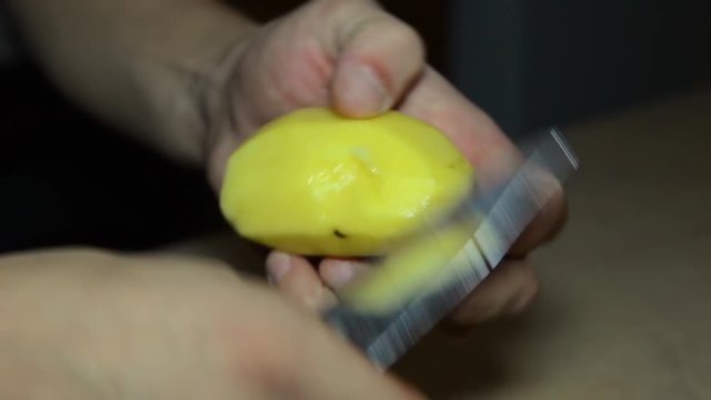 girl with monikjurom cleans potatoes