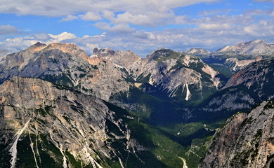 Bright peaks of Italian Alps-Dolomites illuminated by sunshine