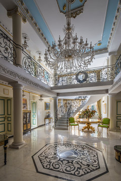luxury lobby interior. Staircase with handmade wrought Iron Railing