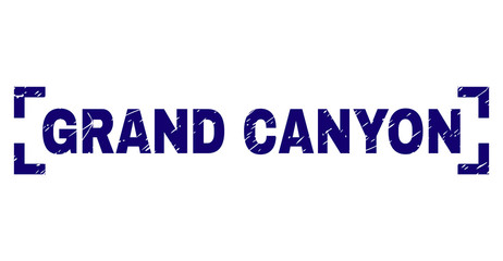GRAND CANYON tag seal print with grunge texture. Text tag is placed between corners. Blue vector rubber print of GRAND CANYON with scratched texture.