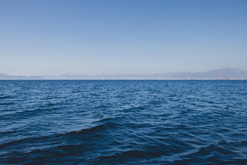 Sea, Distant Land, and Sky