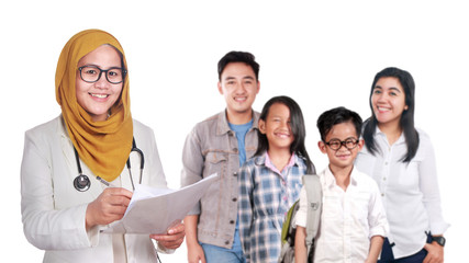 Smiling Family Doctor and Young  Healthy Family. Over white background