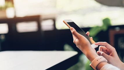 Woman using smartphone, During leisure time. The concept of using the phone is essential in everyday life.