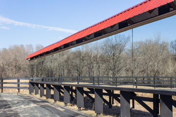 Rear view of wall of mirrors at an outdoor dressage ring, winter, horizontal aspect