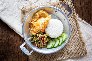 Original fried basil with pork served with jasmine rice and fried egg.