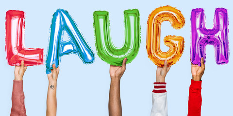Hands showing laugh balloons word
