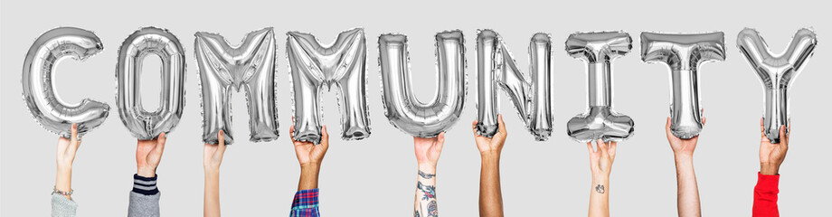 Silver gray alphabet balloons forming the word community