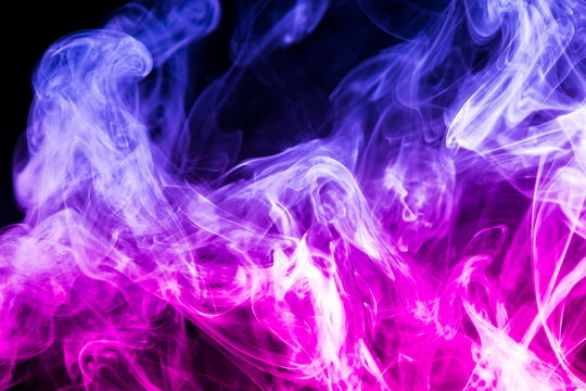 Colored smoke on black background