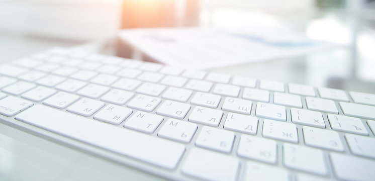 close-up of a computer keyboard on the desktop.