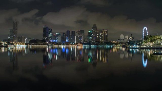 General Cityscape Of Singapore At Night On A Cloudy Night, Time Lapse