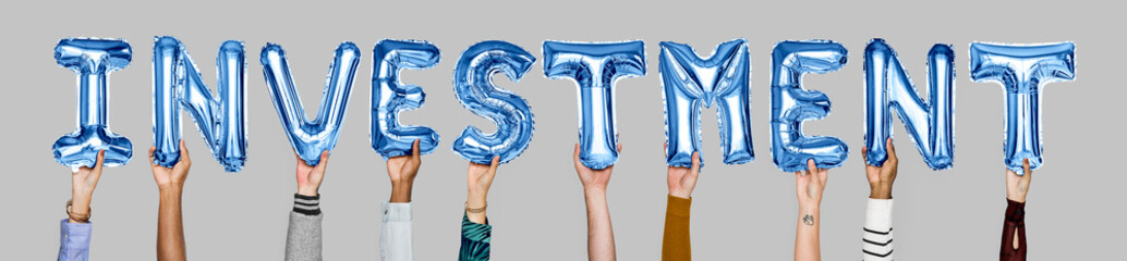 Hands holding investment word in balloon letters