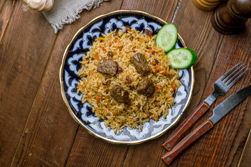 Pilaf sweet with lamb and raisins
