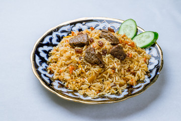 Pilaf sweet with lamb and raisins