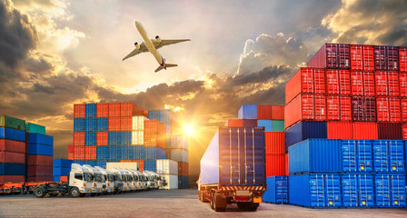 Logistics and transportation of Container Cargo ship and Cargo plane with working crane bridge in...