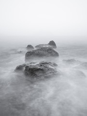 Long exposure: rocks and stones on the seashore