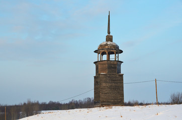 The village of Abramovskaya (Lower Maloshuyka, Vachevskaya). Architectural temple complex. Wooden belfry, 17th-19th centuries. Russia, Arkhangelsk region, Onega district
