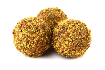 Homemade Candy with Fruits, Nuts and Honey. Rich in Proteins, Fiber and Carbs Healthy Snack. Isolated on White.