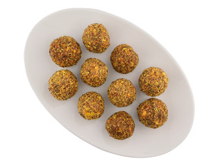 Homemade Candy with Fruits, Nuts and Honey on a Platter. Rich in Proteins, Fiber and Carbs Healthy Snack. Isolated on White.