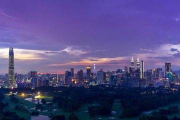 Majestic sunset over Kuala Lumpur, capital of Malaysia. Its modern skyline is dominated by the 451m tall KLCC, a pair of glass and steel clad skyscrapers.