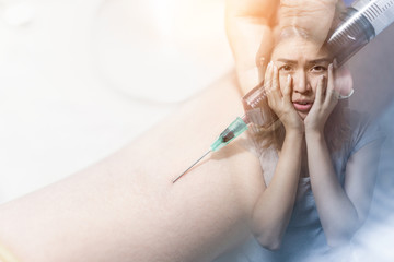 Double exposure, Emotion concept, Close up nurse collecting a blood from a patient and Young asian...