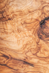 Natural Italian olive wood cutting board like abstract art texture, backboard