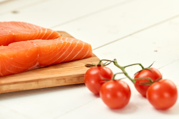 red fish on a wooden white table