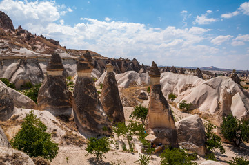 Landscape from Cappadocia. Impressive fairy chimneys of sandstone in the canyon near Cavusin village, Cappadocia, Nevsehir Province in the Central Anatolia Region of Turkey. Winery detail.
