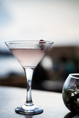 lychee and jasmine infused vodka martini cocktail at sunset bar