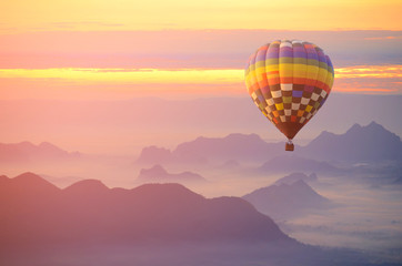 Hot air balloon over the sea of mist.