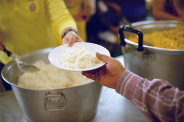 The Society of Sharing Food to Homeless and the Poorest: The Concept of Feeding