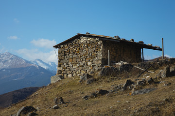 An old stone hut in the mountains. The Republic of Dagestan.