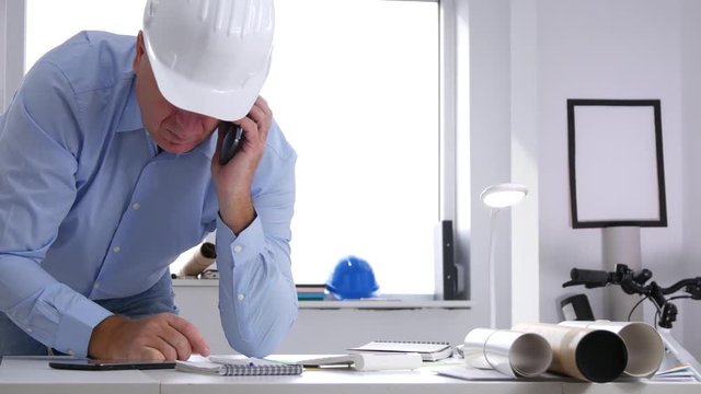 Engineer Image in Office Room Make a Phone Call Using Mobile