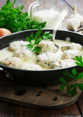 Chicken meatballs in milk sauce
