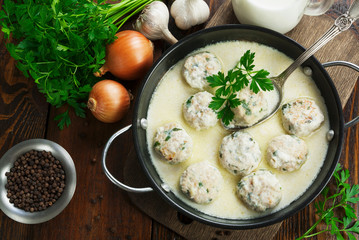 Chicken meatballs in milk sauce