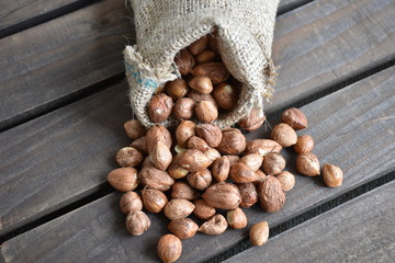 High angle of the hazelnuts on the wooden table