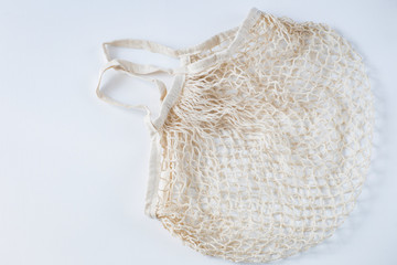 empty wicker bag for shopping on a white background
